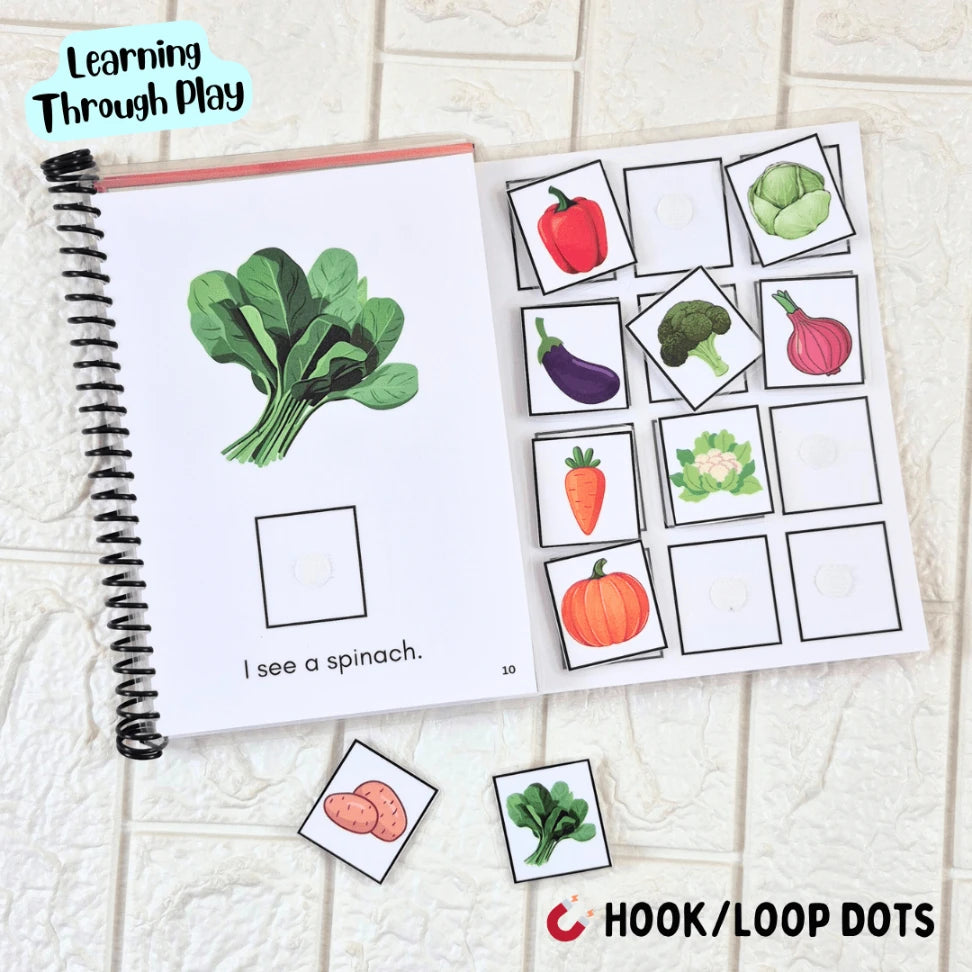 Toddler engaging with adapted book set to build vocabulary and language skills